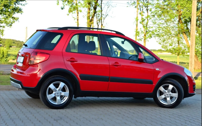 Suzuki SX4 cena 31900 przebieg: 93865, rok produkcji 2013 z Piastów małe 562
